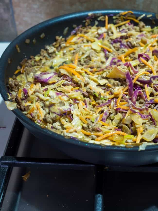 cooked cabbage in a frying pan