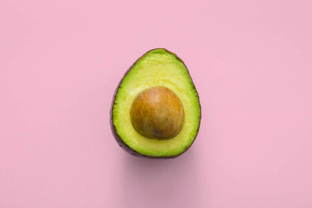 avocado on pink background